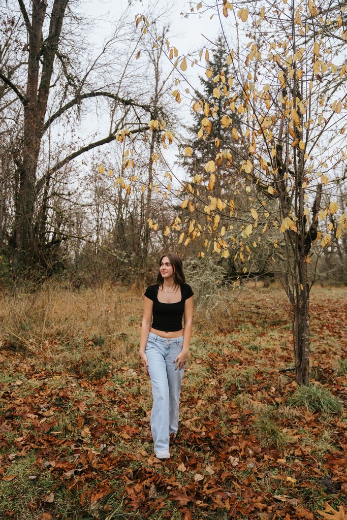 senior walking through leaves in springfield oregon