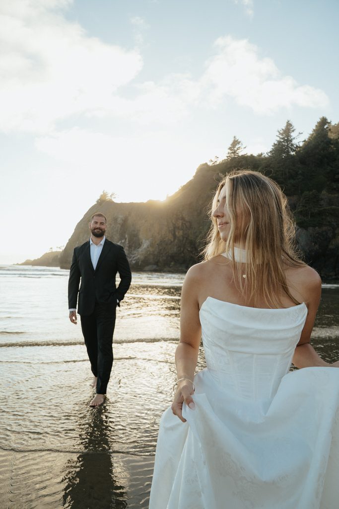 on the oregon coast at agate beach a couple walking at sunset