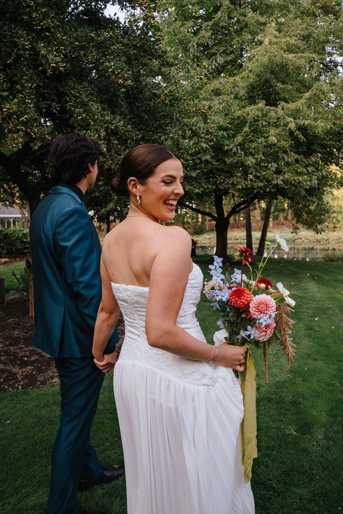 fun documentary wedding portraits of couple at garden at riverside in corvallis, oregon