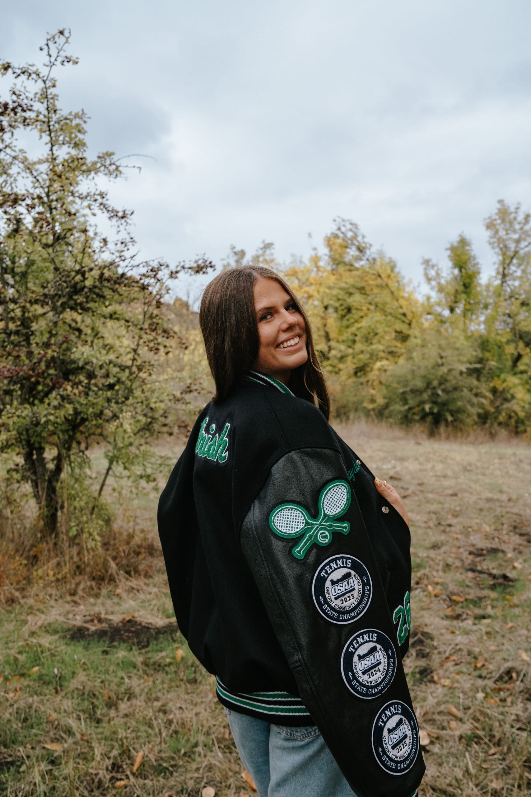 senior in varsity jacket at Dorris Ranch in Springfield, Oregon